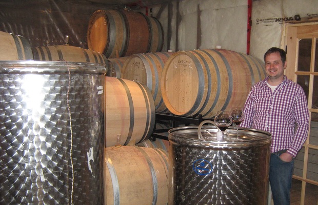 Winemaker Ilya Senchuk in the Leaning Post Barrel Room