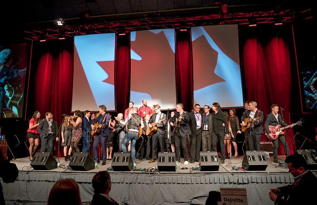 Candian musicians and atheletes sing O Canada at Gold Medal Plates Toronto 2014 (c) Ronald Ng Photography