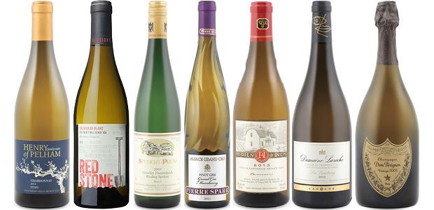 From left to right: Henry Of Pelham Estate Chardonnay 2013, Studert Prüm Graacher Himmelreich Spätlese Riesling 2009, Redstone Limestone Vineyard Sauvignon Blanc 2013, Pierre Sparr Mambourg Pinot Gris 2011, Hidden Bench Chardonnay 2013, Domaine Laroche Les Vaudevey Chablis 1er Cru 2012 and Dom Pérignon Brut Vintage Champagne 2005